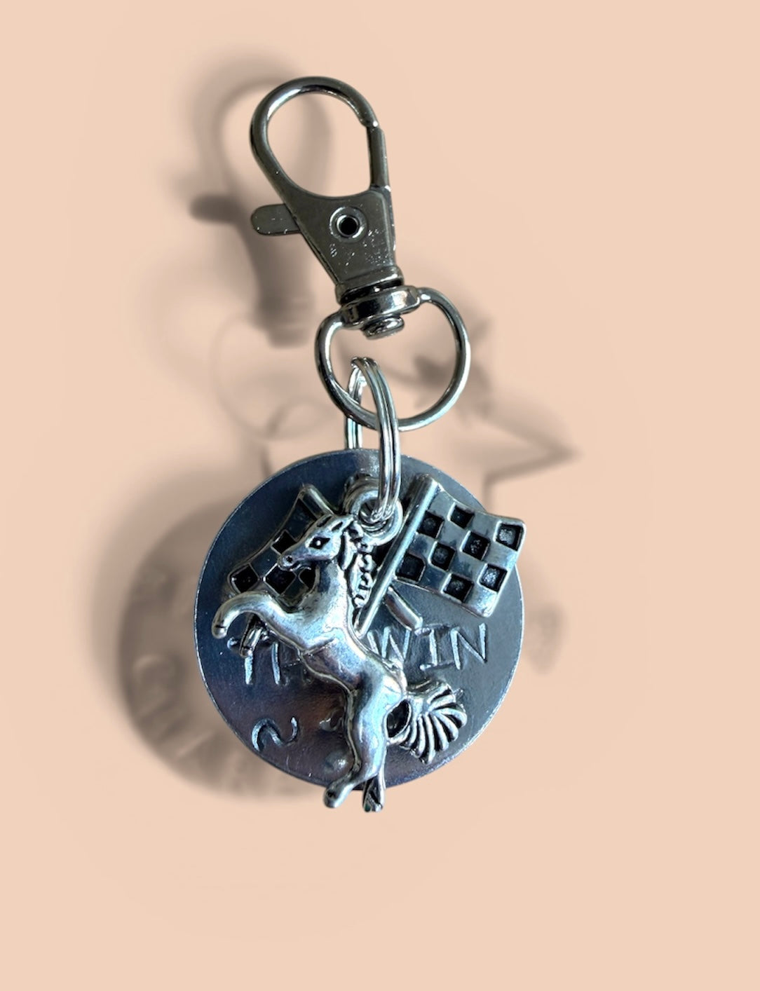 ‘Chase The Win’ Bridle Charm. Hand stamped.